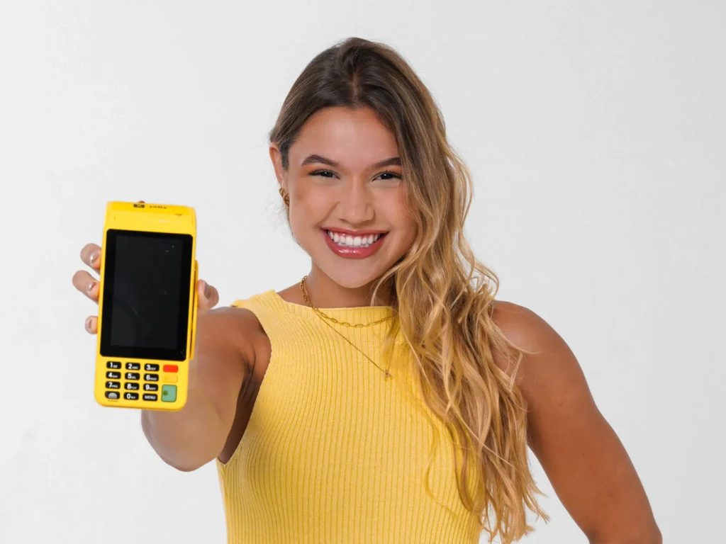 Yelly é a maquininha sem aluguel, perfeita para MEI, CNPJ e autônomos. Parcele em até 18x e receba no dia seguinte com as menores taxas.